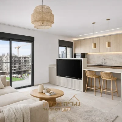 אי מטבח עם עמדת טלוויזיה מודרנית